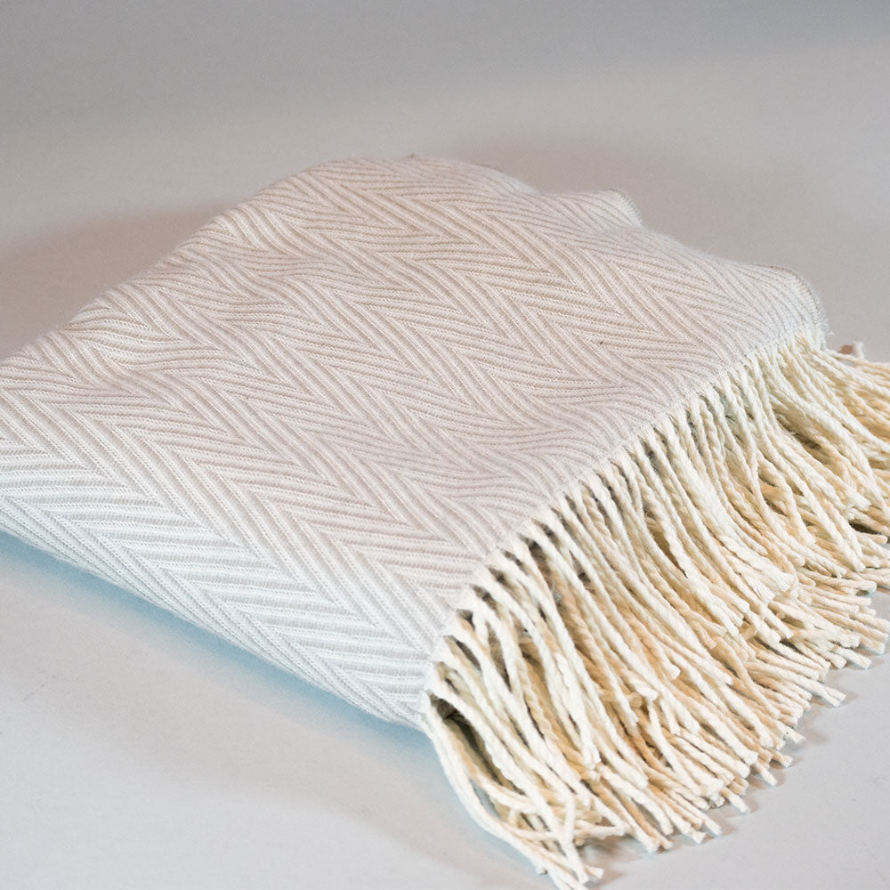 
                  
                    Manta Beige Hilo
                  
                